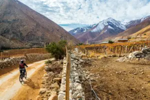 Young,woman,mountain,biking,in,the,elqui,valley,near,vicuna,